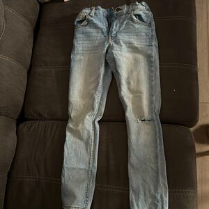 Light blue wash skinny denim. Distressed. Size 8